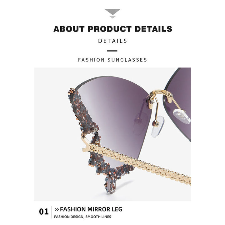 Butterfly-shaped sparkling rhinestone-rimmed sunglasses