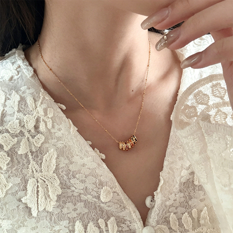 Rotating colored zircon necklace and earring set